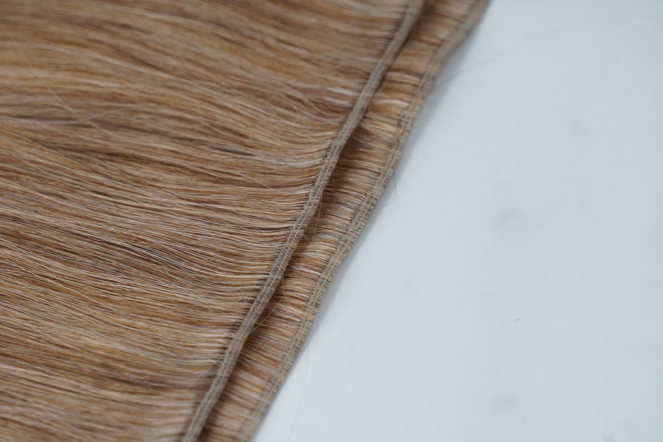 Tissage cheveux naturel : Genius Weft, Machine Weft et Raw Hair